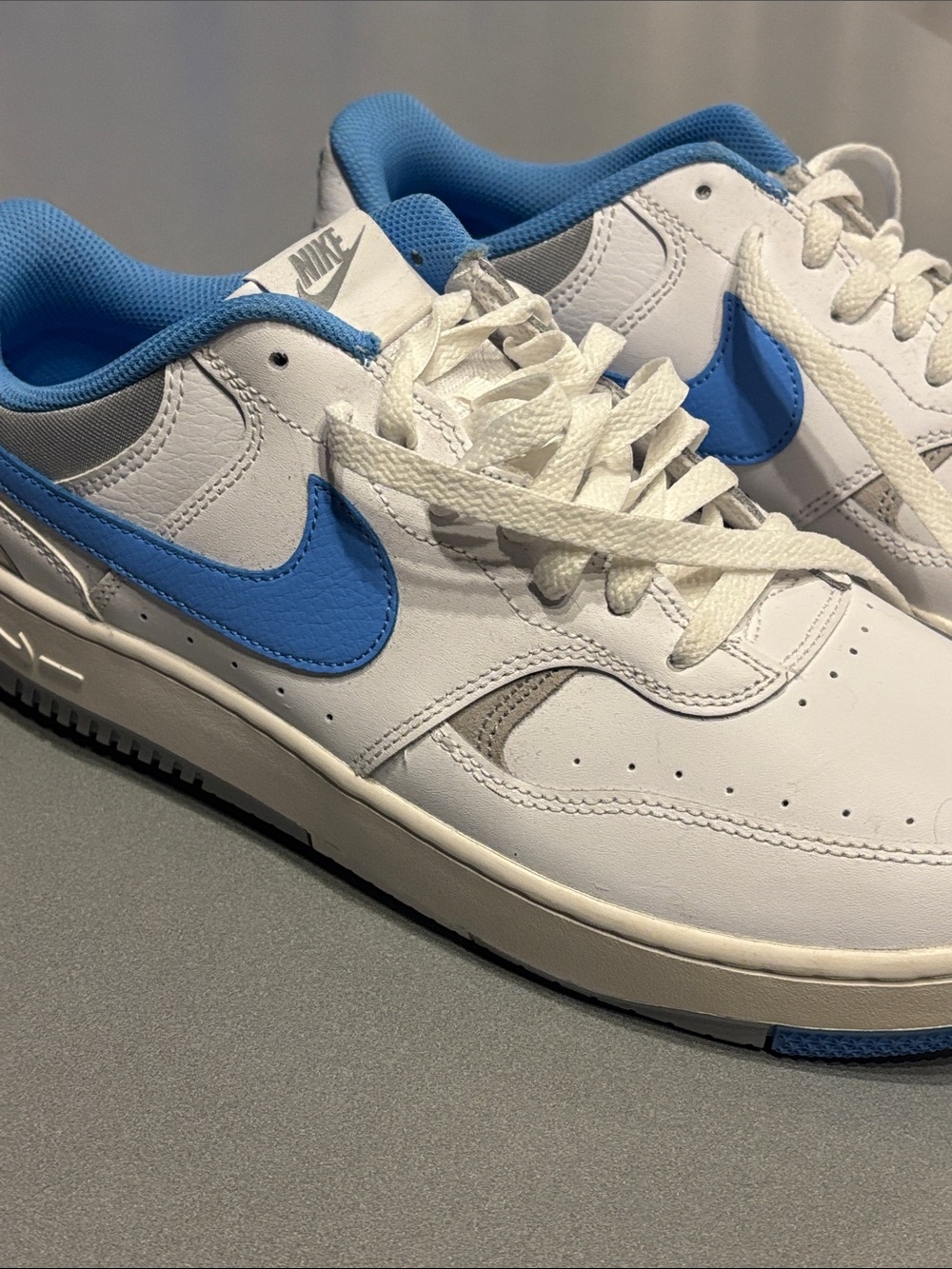 Women Nike Low Top Sneakers in White and Light Blue